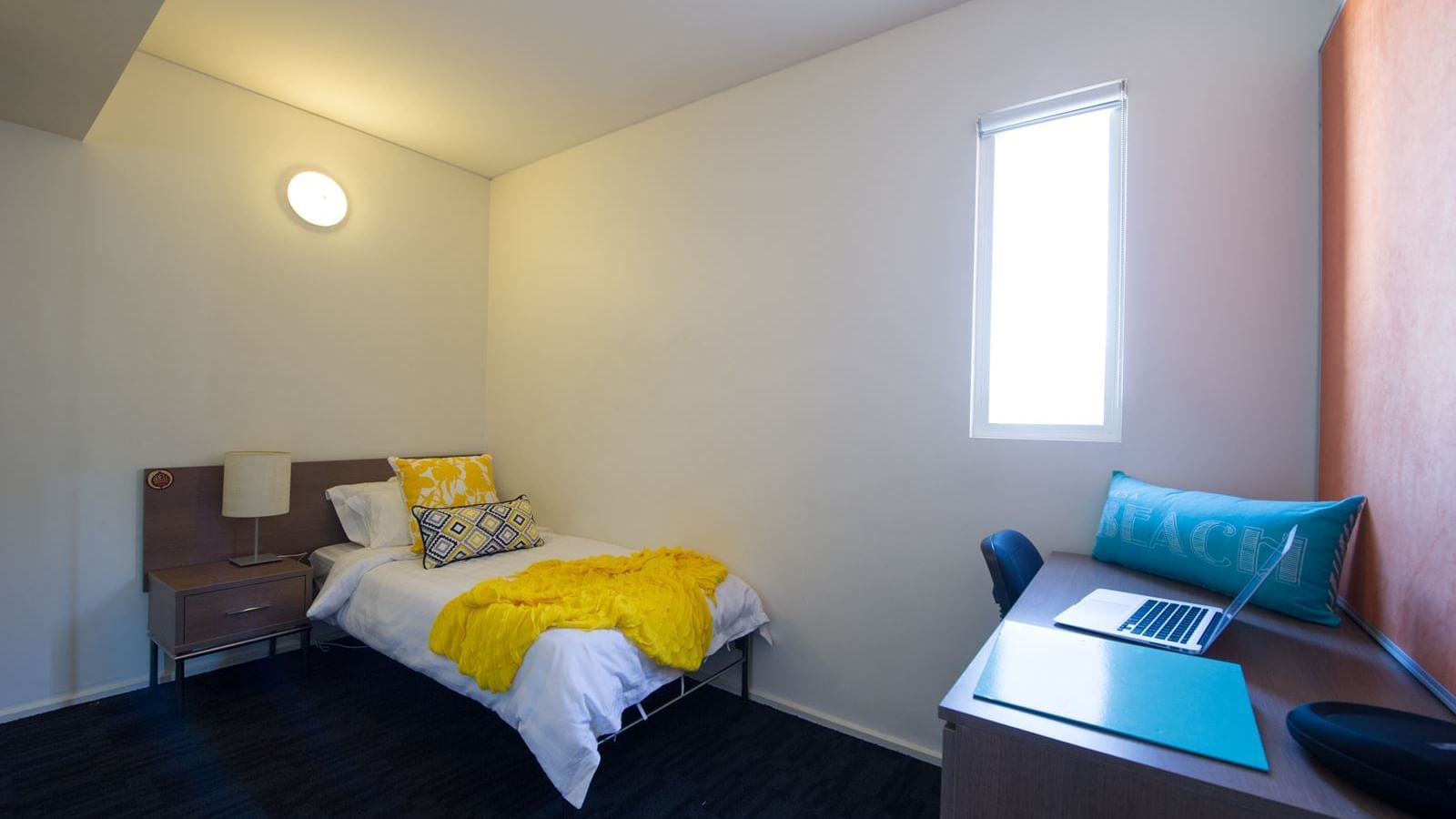 Student Living East West_Adelaide bedroom featuring study desk, chair, single bed & wardrobe