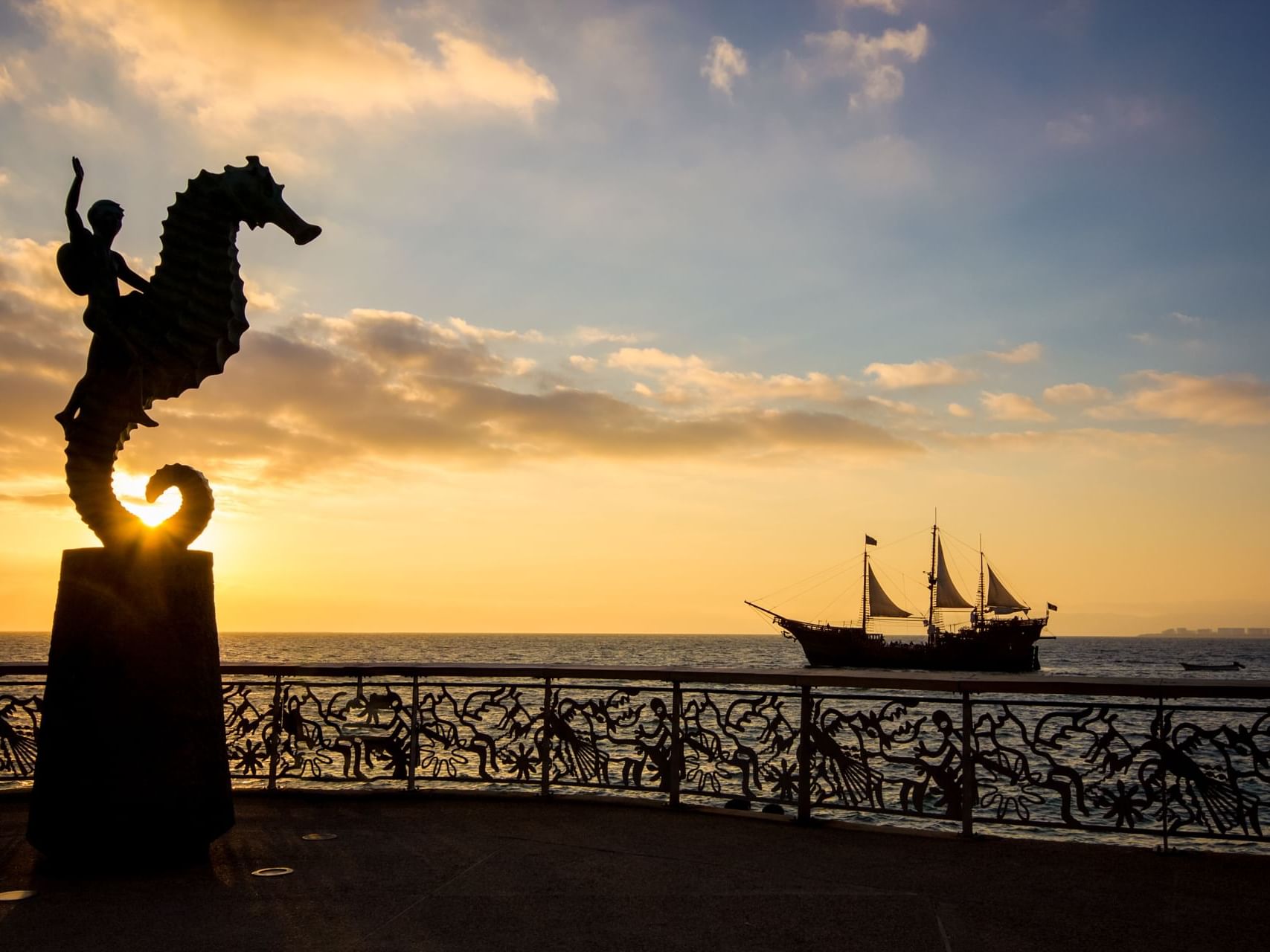 Statue in Malecon Sunset Walk near Los Arcos Suites