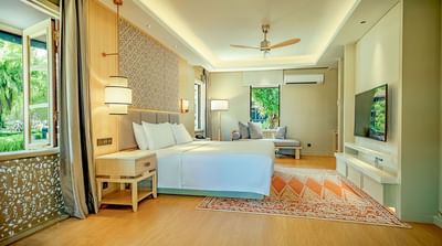 King bed in Pelangi Junior Suite at Pelangi Beach Resort & Spa