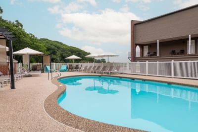 Outdoor pool and patio at Ogunquit River Inn
