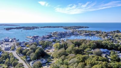 Aerial view of the city & Beach surrounding Falmouth Tides