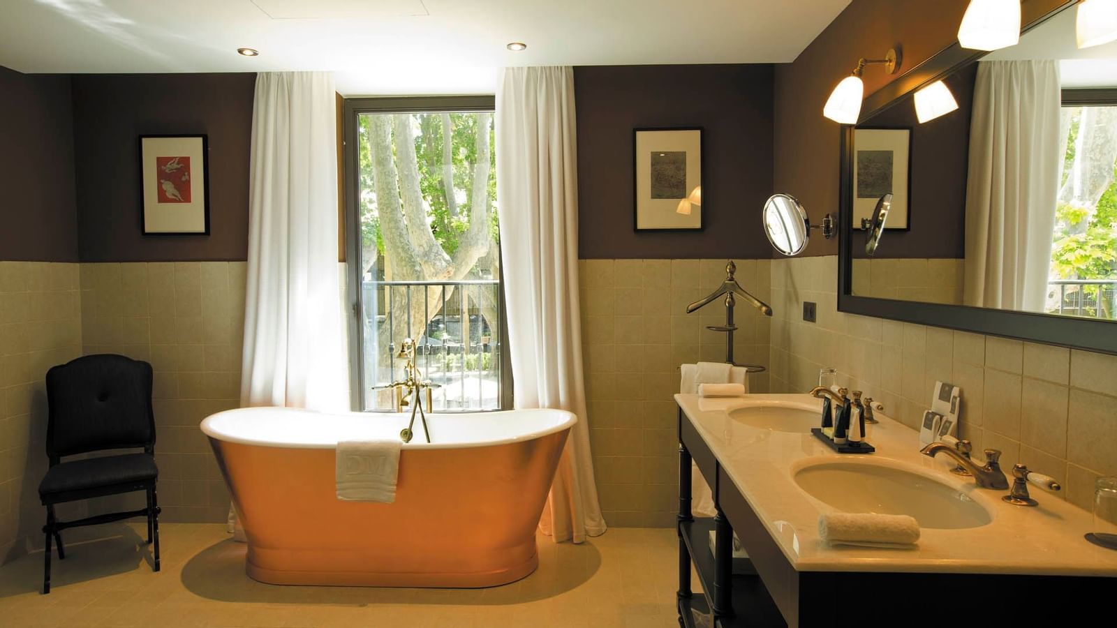 Bathtub & vanity in Manville Suite at Domaine de Manville