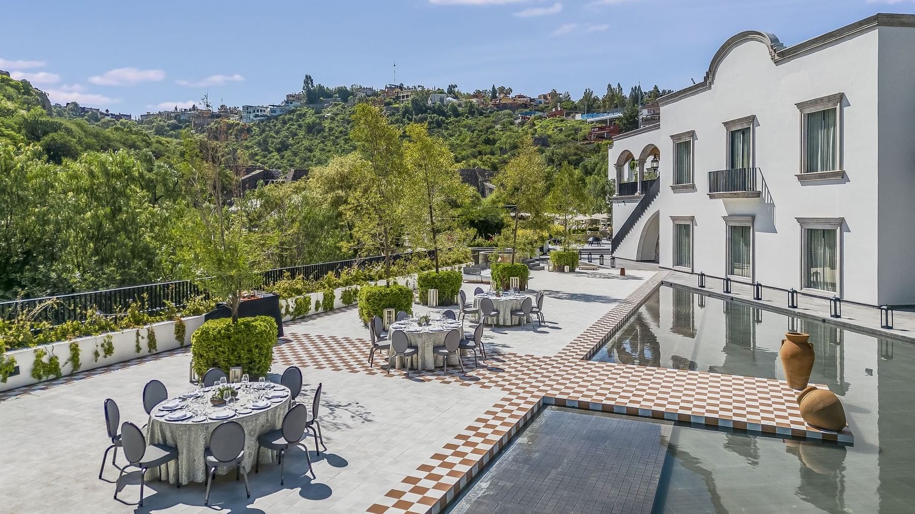 Exterior view of Live Aqua San Miguel de Allende with dining and pool area