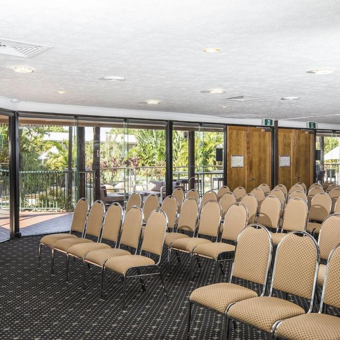 Lakes Room featuring theater set up with large windows overlooking the garden at Mercure Hotel Townsville