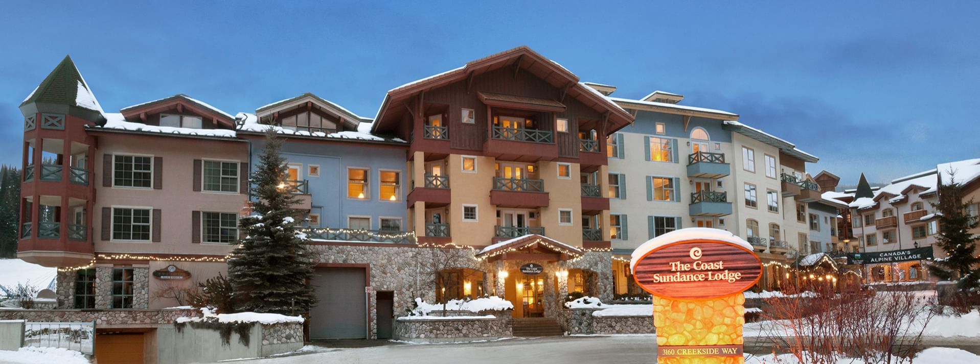 Exterior of Coast Sundance Lodge with snow on ground