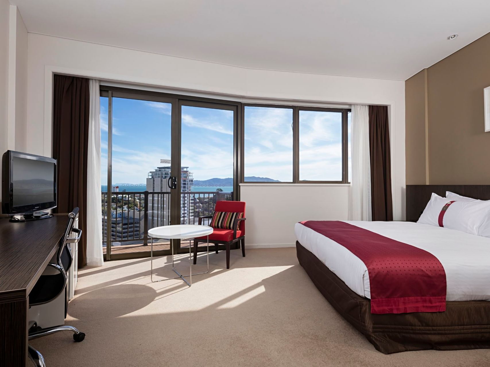 King bed, work desk & TV in Executive King Room at Hotel Grand Chancellor Townsville