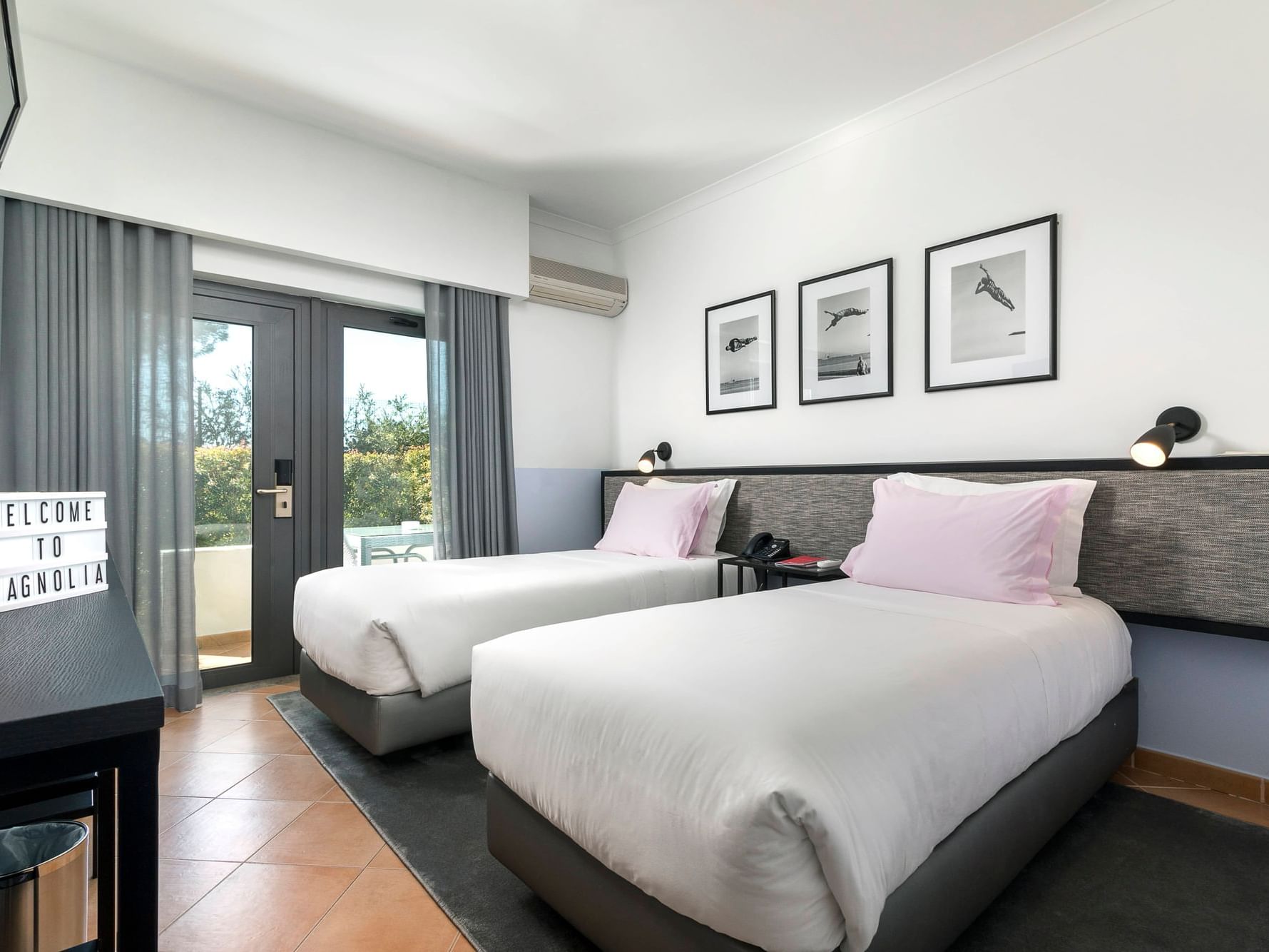 Interior of standard twin room at The Magnolia Hotel