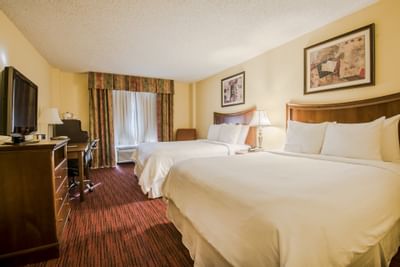 Deluxe Queen Double with with twin beds at MCM Elegante Suites