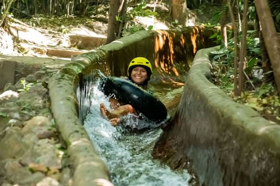 Lady enjoying Natural water slide near Buena Vista Del Rincon