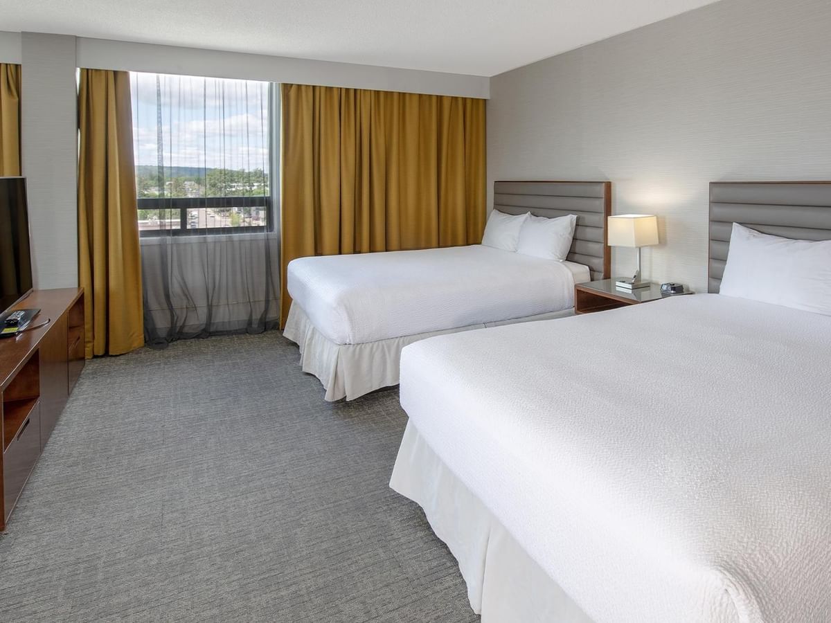 Coast Premium Two Queens Junior Suite with two queen beds, city views, and modern furnishings at Coast Prince George Hotel.
