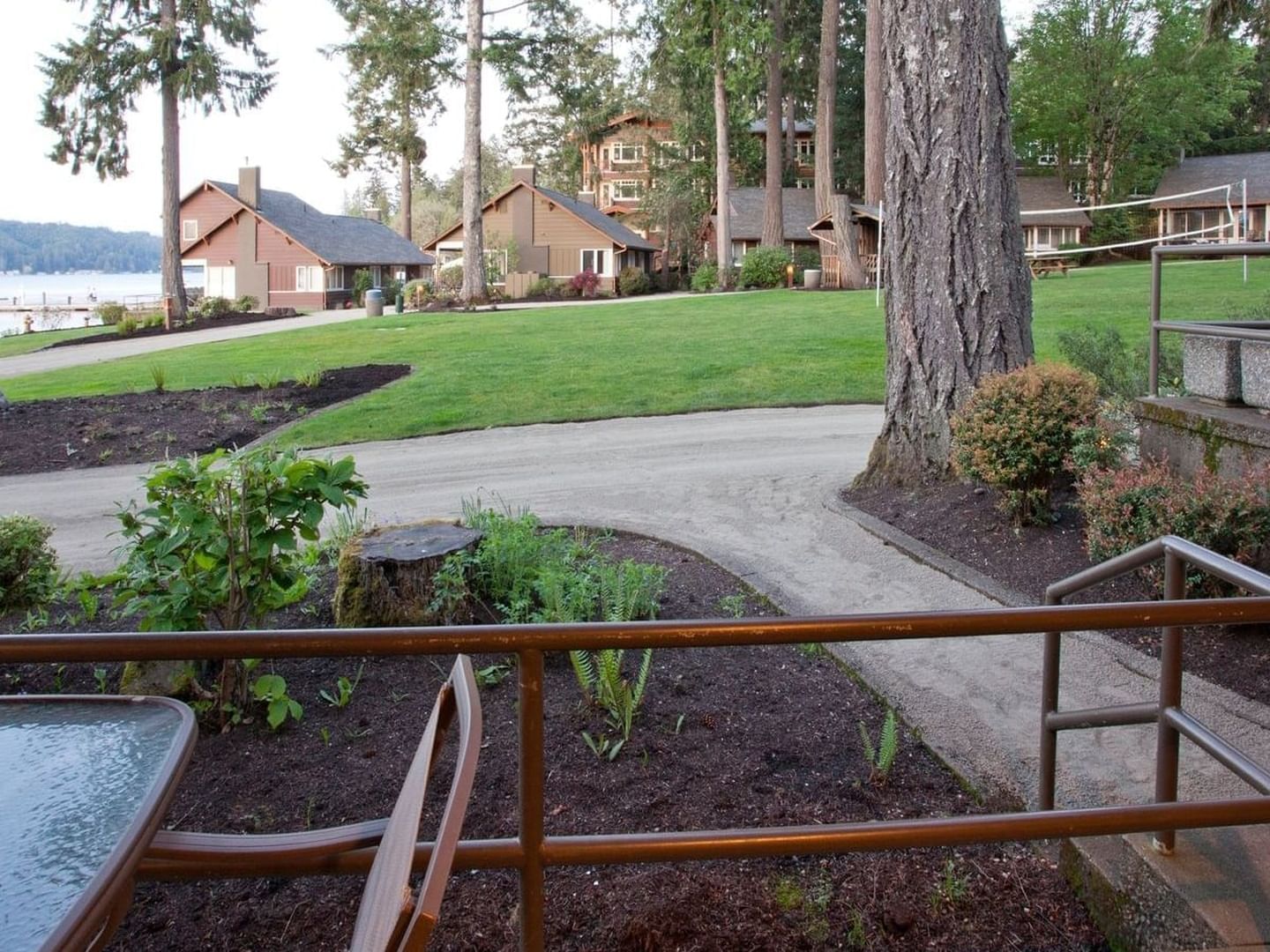 View of the garden from One Bedroom Cottage patio at Alderbrook Resort & Spa