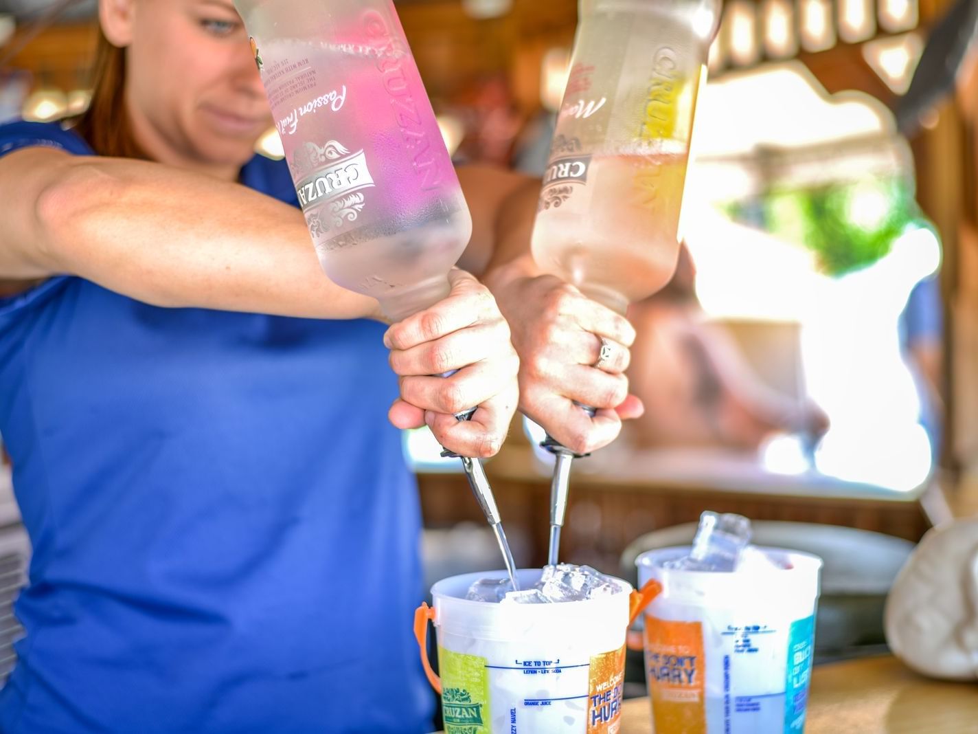 A bartender at Aloha Tiki Bar & Grill in Mystic Dunes Resort