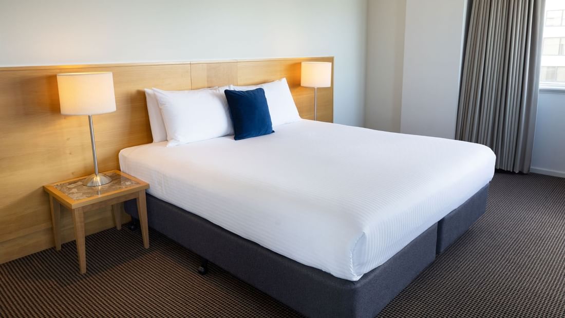 Comfortable bed in Superior Suite