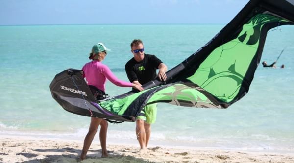 Couple Kiteboarding near The Somerset On Grace Bay
