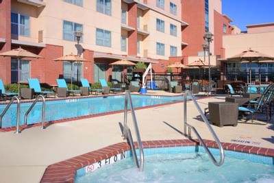 outdoor pool with hot tub