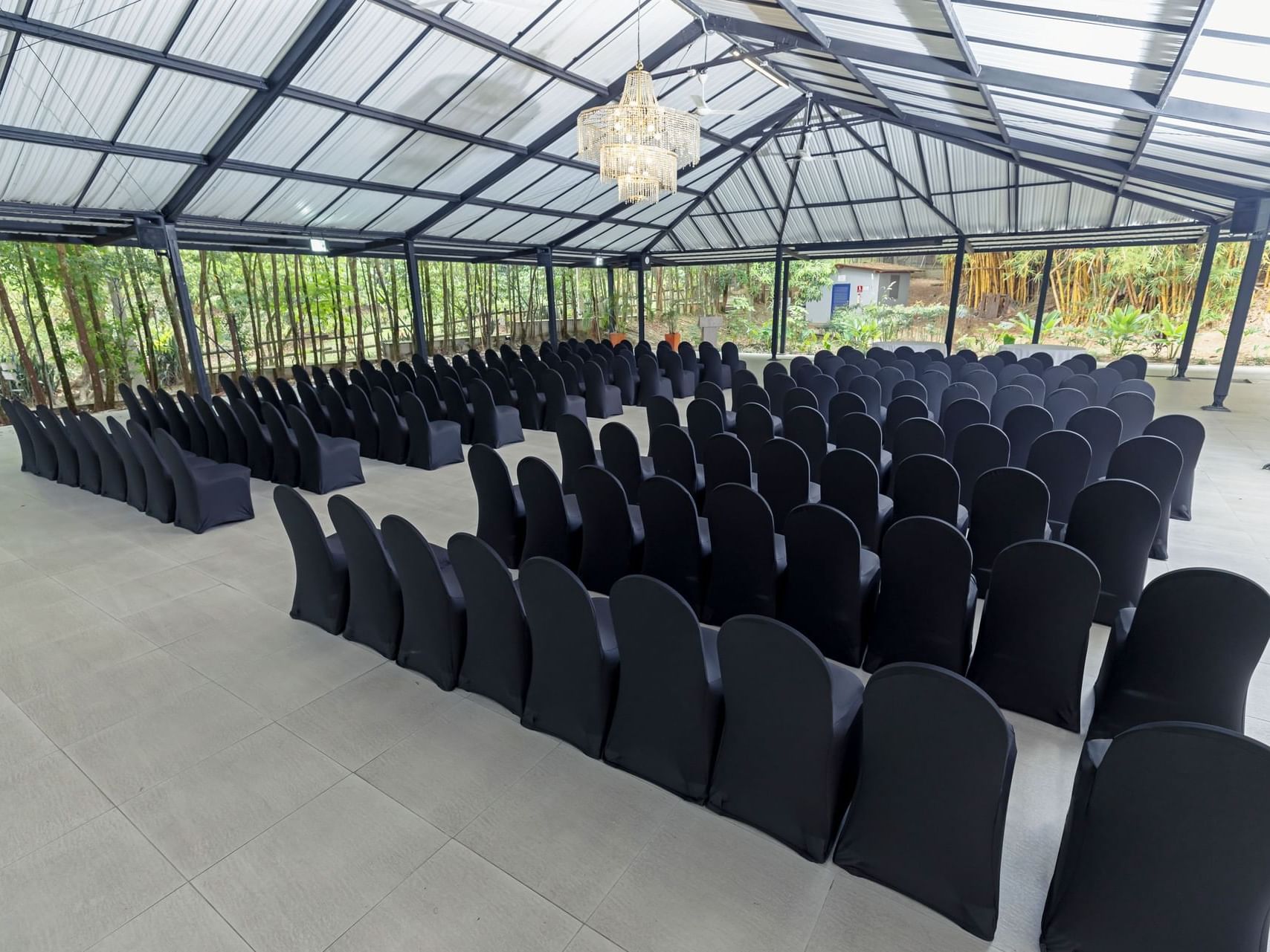 Theater-style chair arrangement in Domo Piscina at Hotel Dann Carlton Medellin