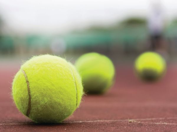 Tennis balls at the tennis court in Topnotch Stowe Resort
