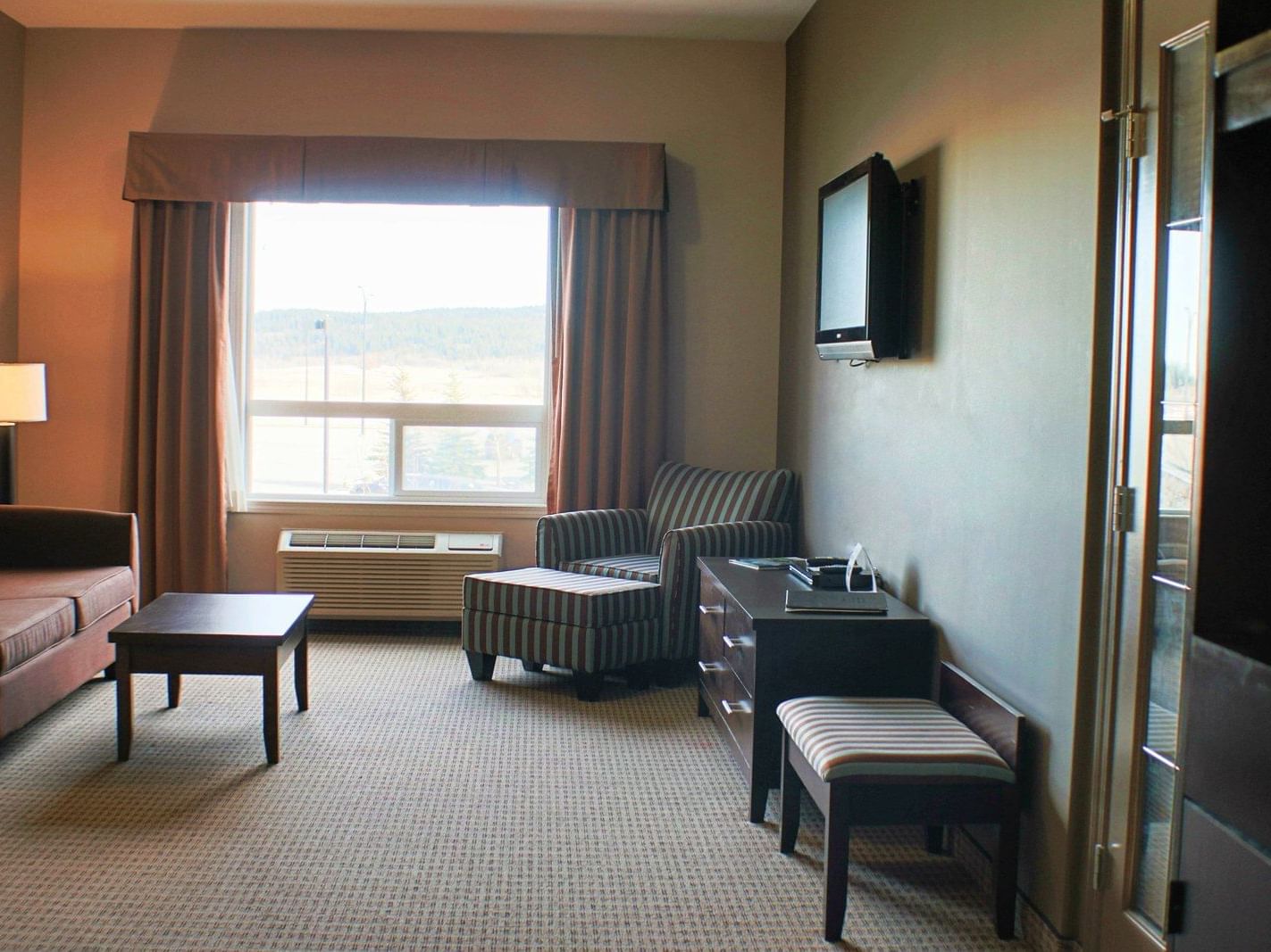 Living area in One Bedroom Suite at Stoney Nakoda Resort