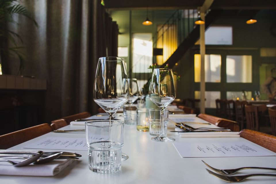 Close up of a dining table setup at Amadeus City Hotel