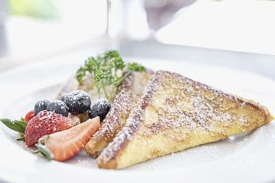 Close-up of Sweet Bread French Toast served in Ilima Cafe at Waikiki Resort Hotel by Sono