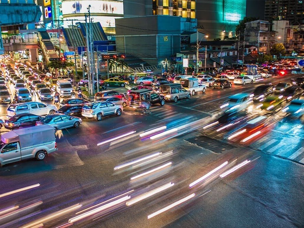 Busy roads at night in Bangkok near Amora Hotel
