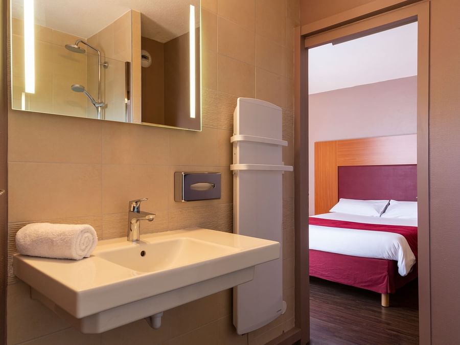 Bathroom vanity of bedrooms at Hotel Le Sextant