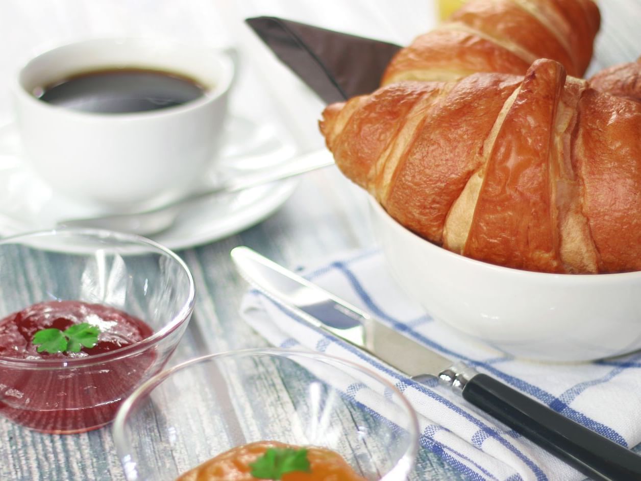 a small breakfast of coffee and croissants