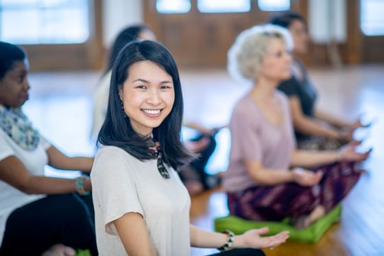 Woman smiling during yoga