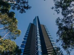 Low angle shot of Eureka Tower near Brady Hotel Jones Lane