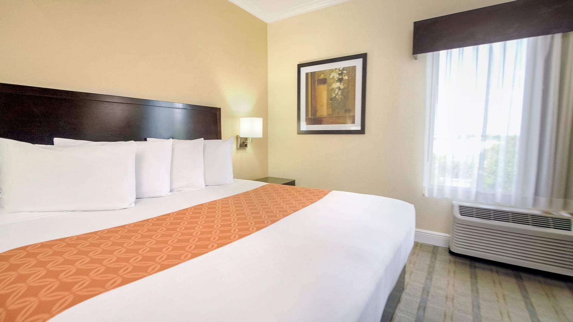 King bed in King bed accessible room at Galleria Palms Hotel