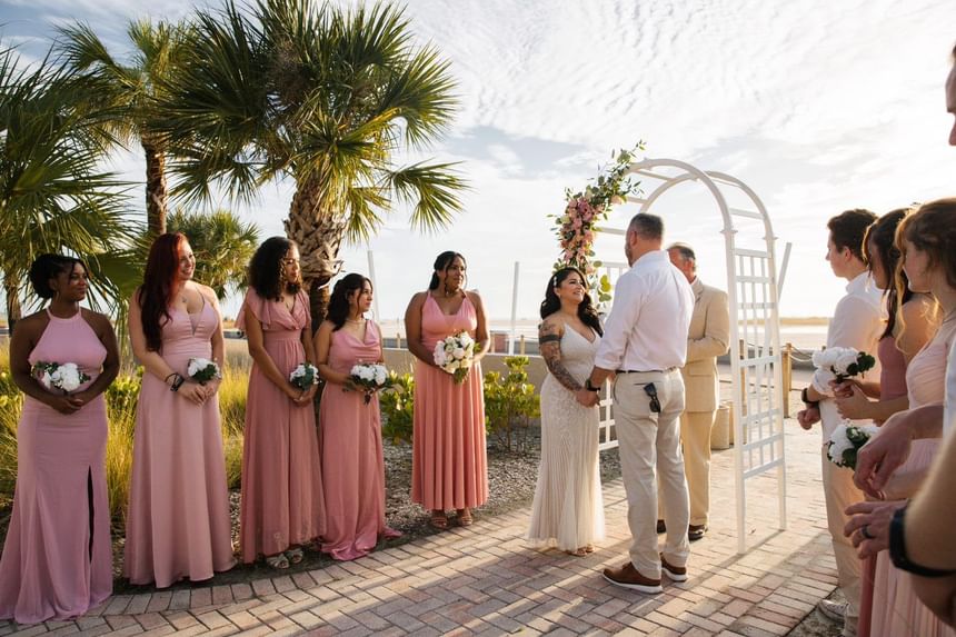 Outdoor wedding ceremony at Thunderbird Beach Resort