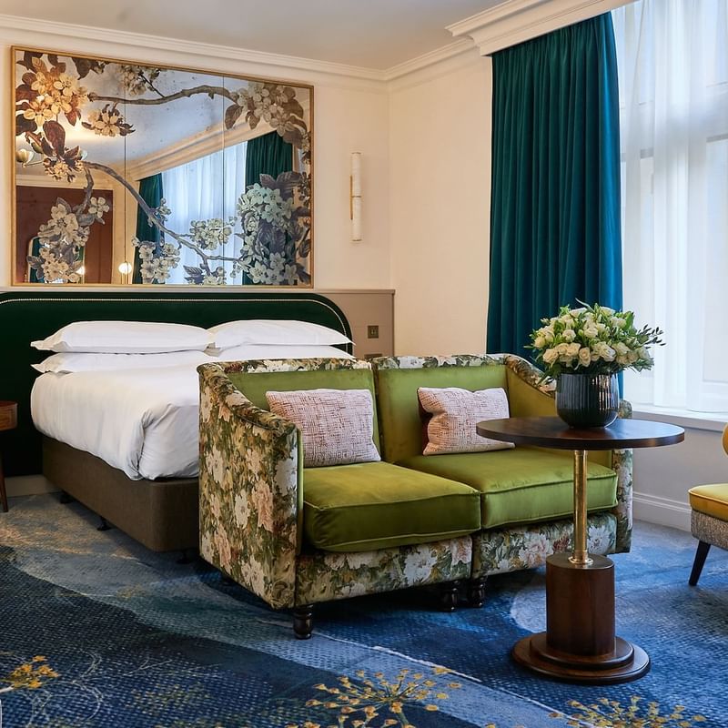 Bed with seating area in Capital Deluxe King or Queen at Capital Hotel London