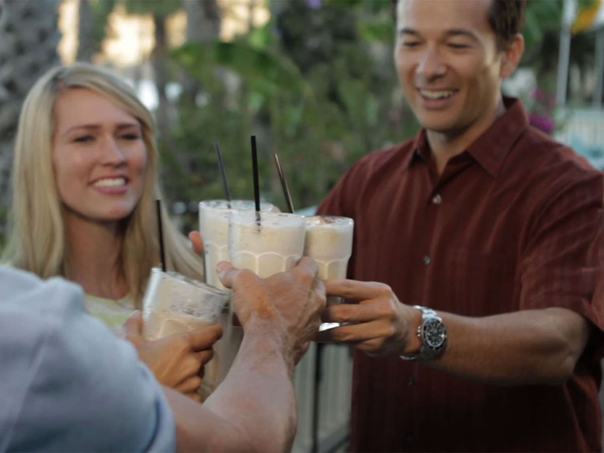 People enjoying classic Buffalo Milk in Harbor Reef Saloon at Inn at Mt Ada