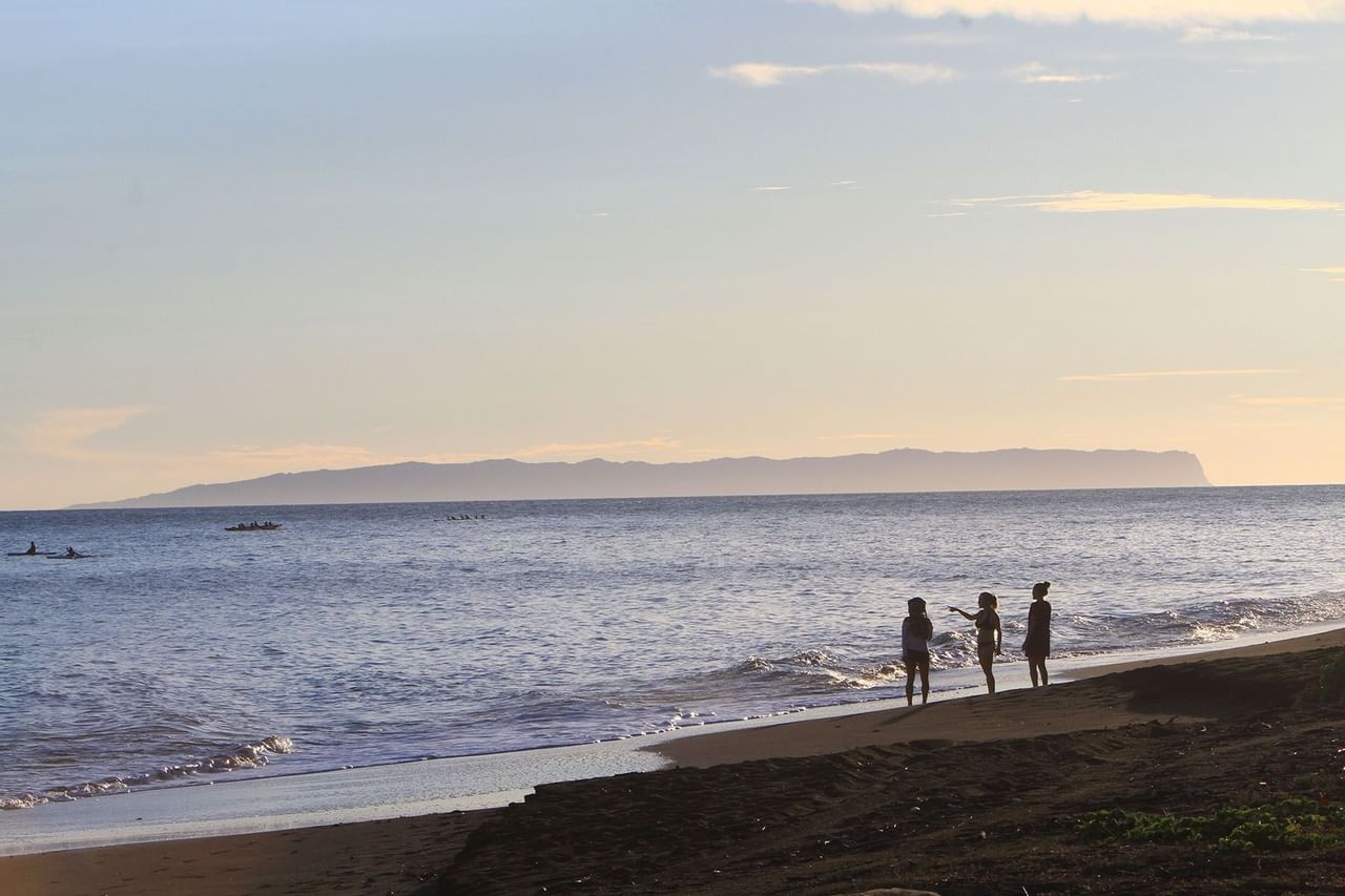 kids on beach at Waimea Plantation Cottages