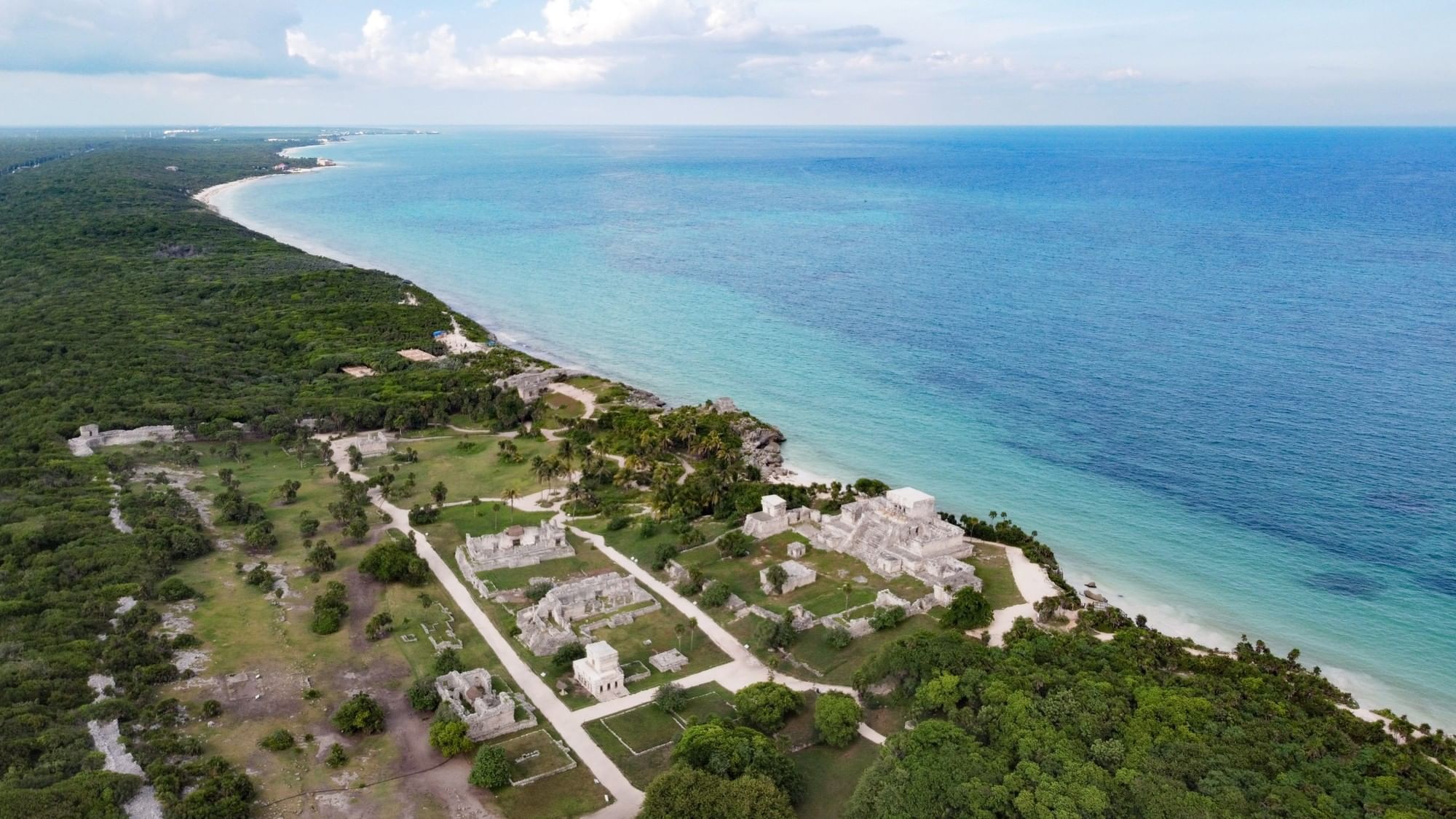 Aerial view of Tulum's Maya archaeological site beside the Caribbean Sea