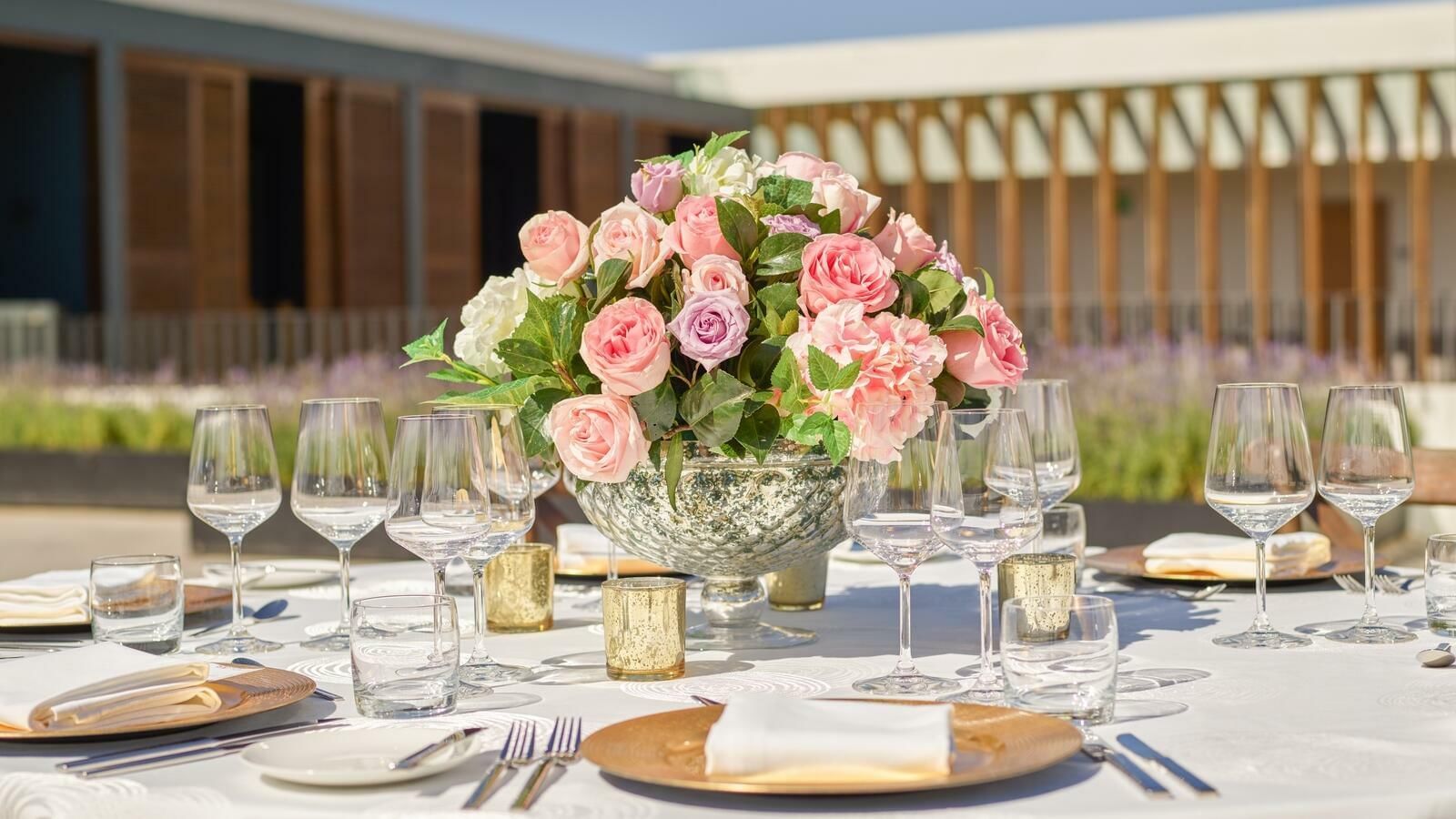 Banquet tables arranged for a wedding at Live Aqua Resorts