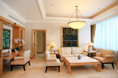 Senator Suite living area with cozy sofa at Hanoi Daewoo Hotel