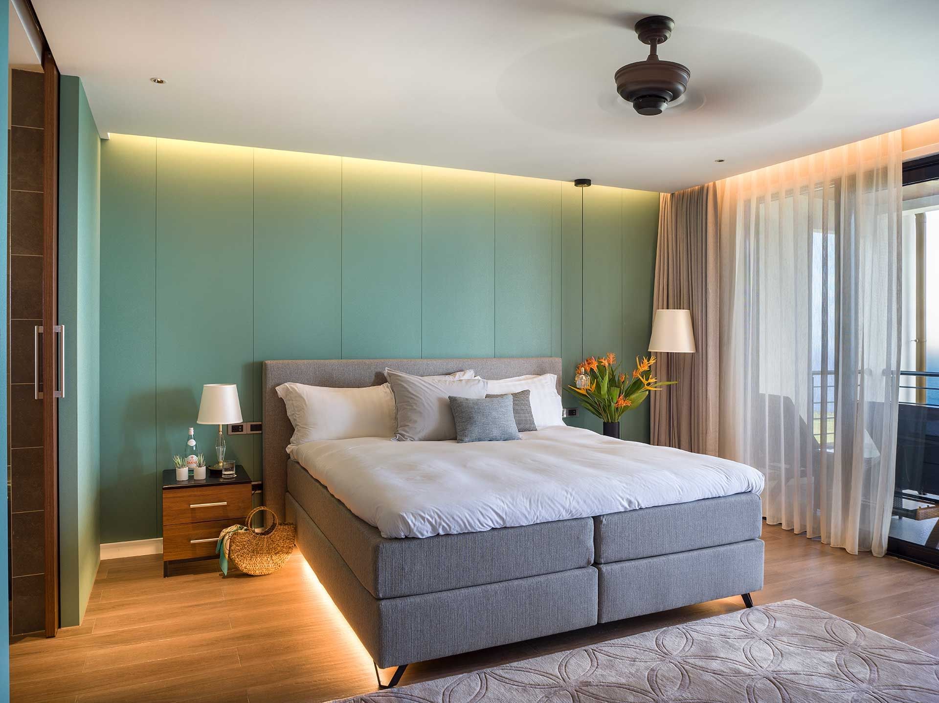 King bed in Deluxe Rooms at Golden Rock Resort