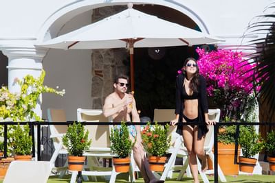 Couple enjoying the afternoon at Playa Los Arcos