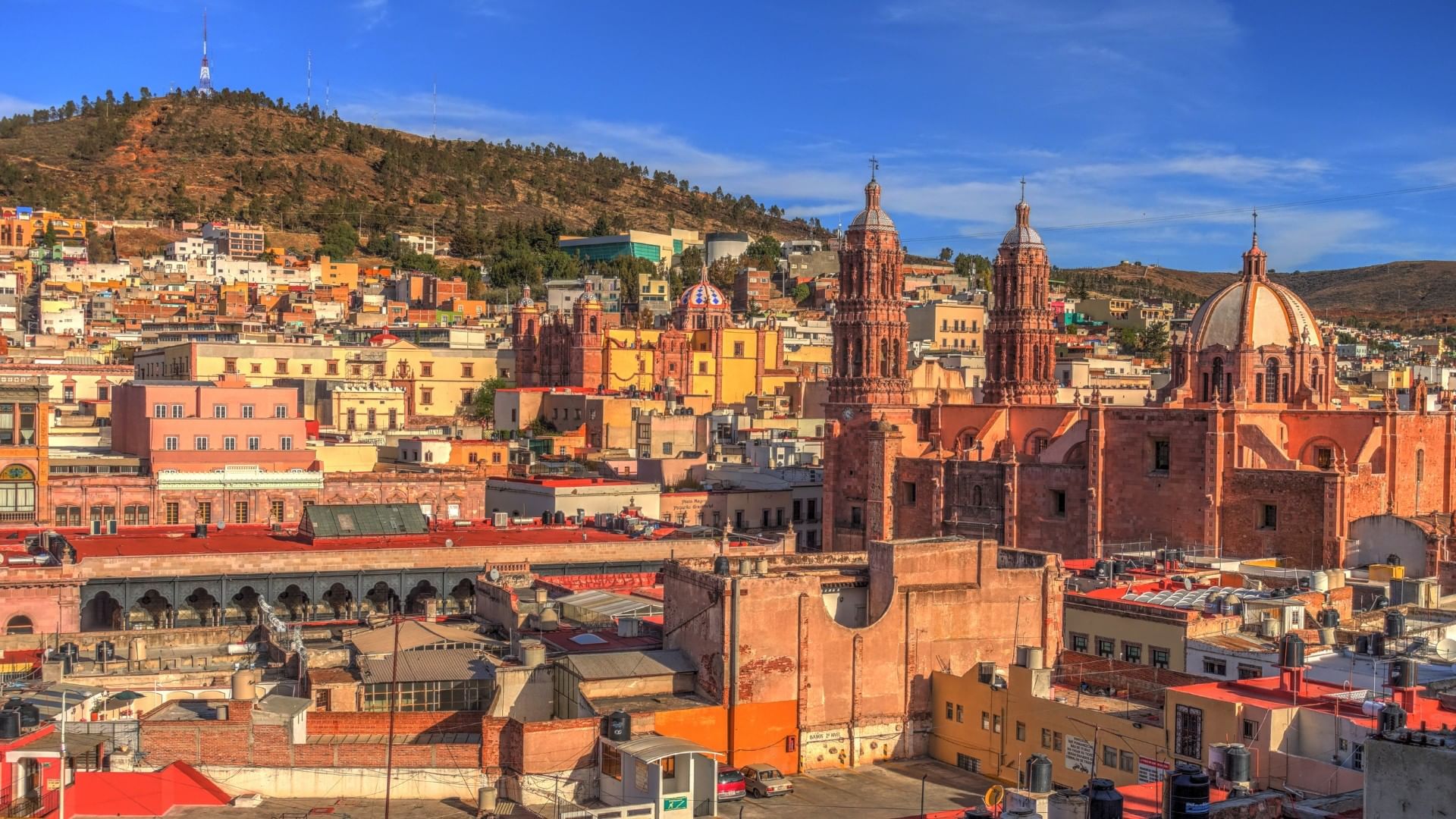 Centro internacional de ferias y exposiciones, cityscape of historic town buildings & cathedrals near Quinta Real Zacatecas