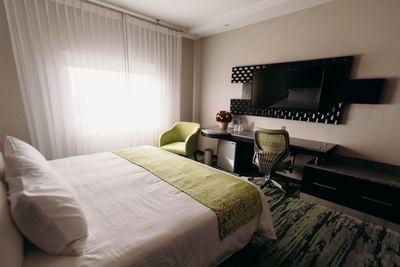 Double bed, TV & work desk in Superior Room at Araiza San Luis