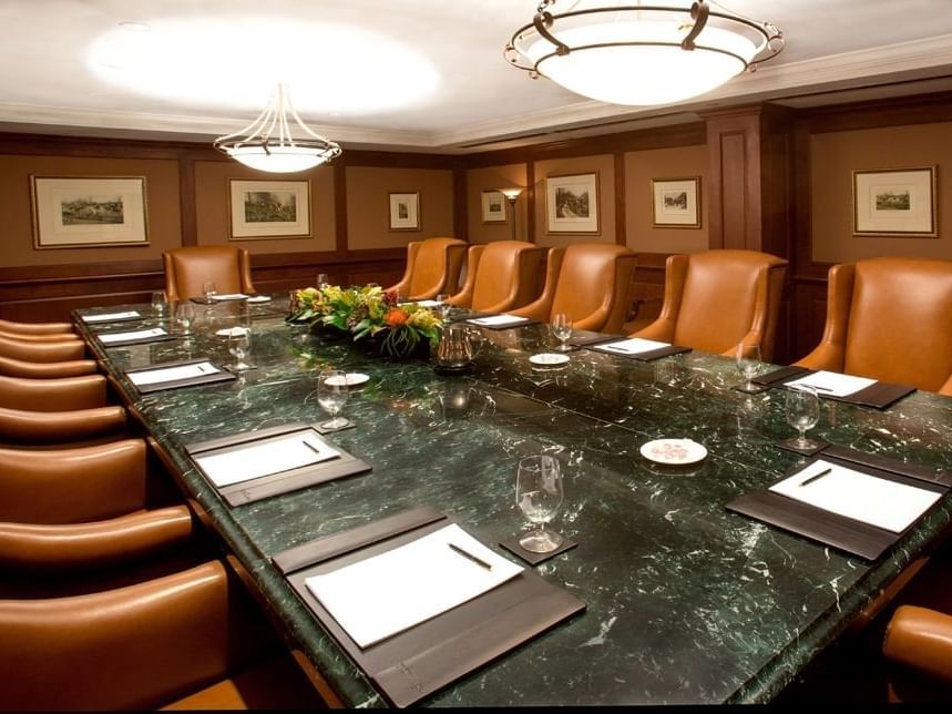 Large meeting table in Woodward Boardroom at The Townsend Hotel