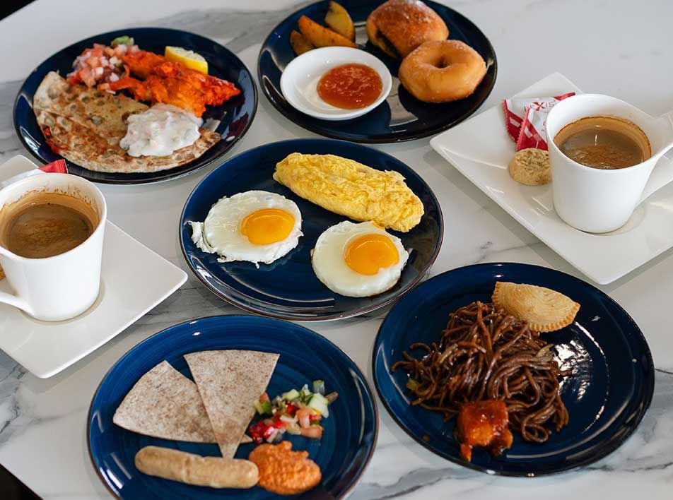 continental breakfast spread including bread and omelette at a half-board resort