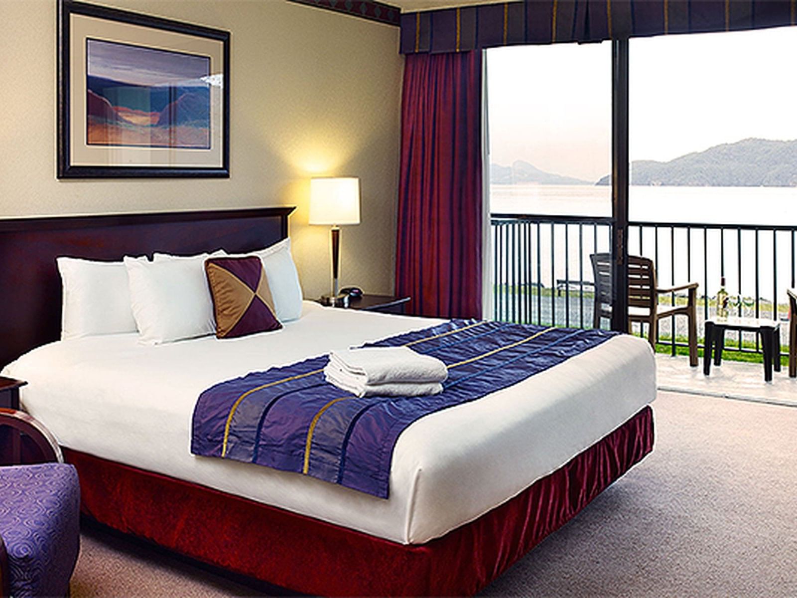 West Tower: Lake View King with cozy bed at Harrison Hot Springs Resort