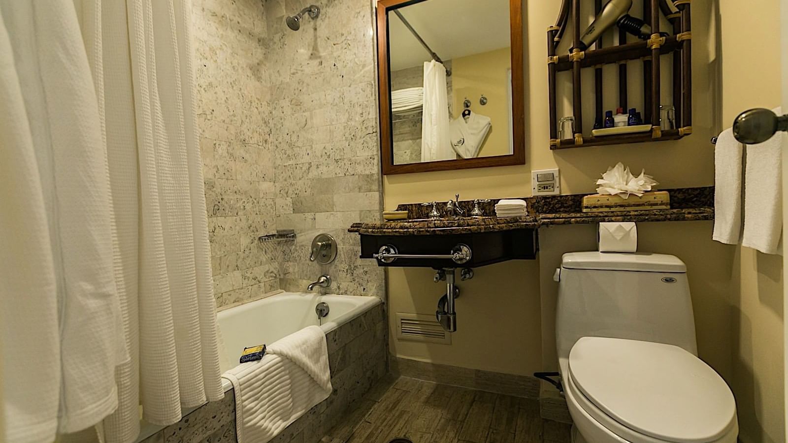 Bathroom with a bathtub in Junior King Suite Garden Room at Pierre Mundo Imperial