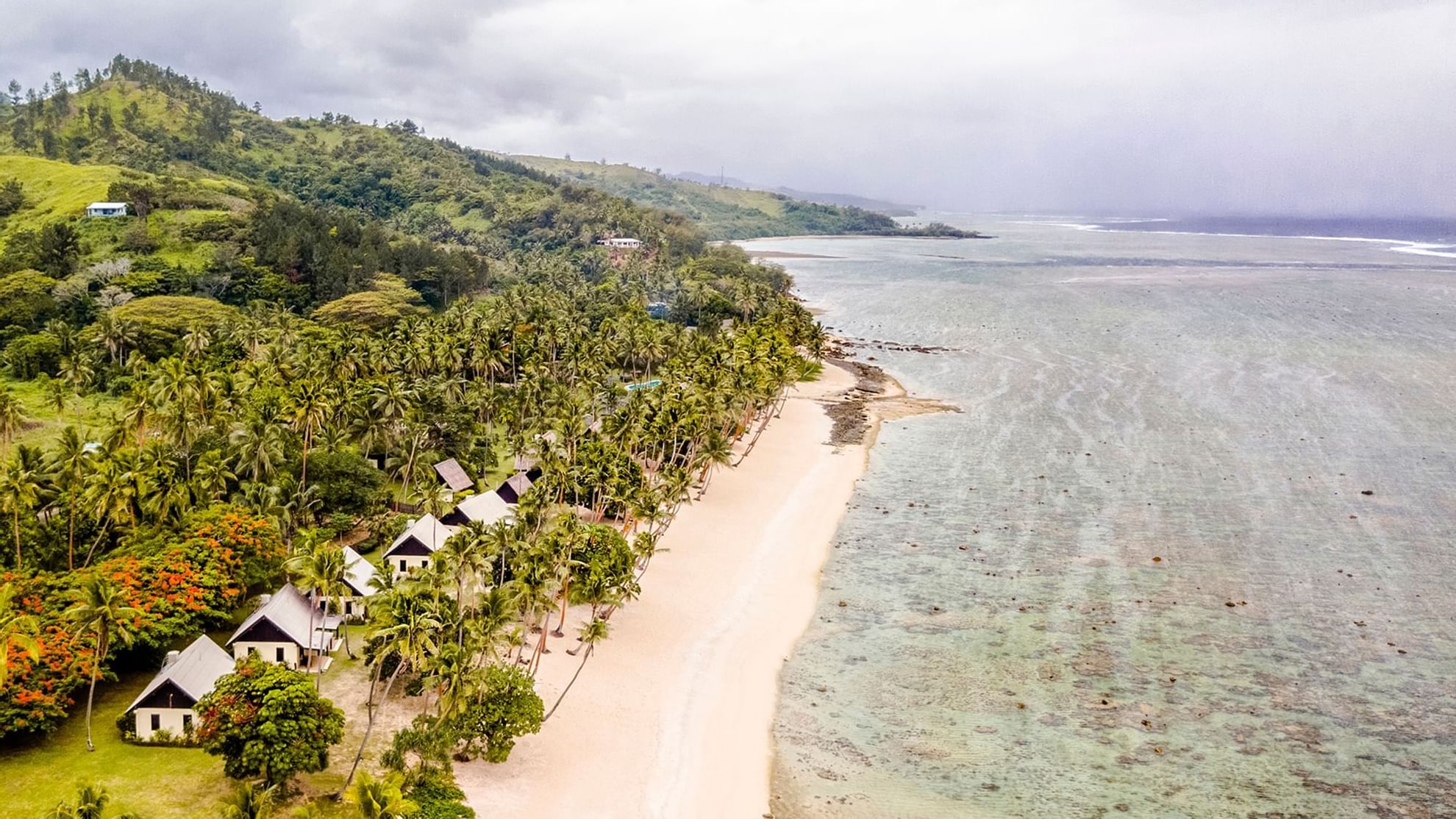 Aerial view of beach coast at Tambua Sands Beach Resort