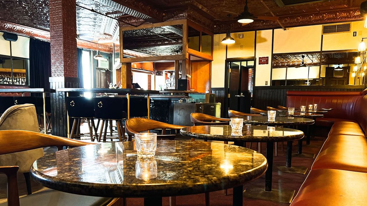 Dining arrangements inMidnight Sun Lounge at Midnight Sun, a Coast Hotel