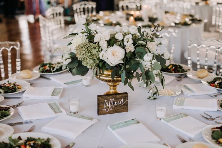 Round tables beautifully set for a wedding at our Diamond Beach wedding venue