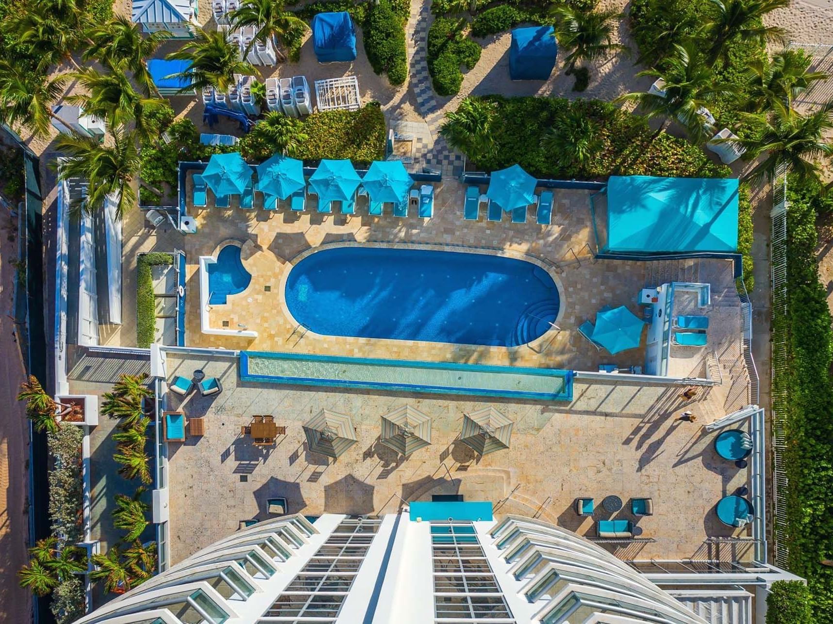 Top view of terrace with pool, lounge at Marenas Resort Miami