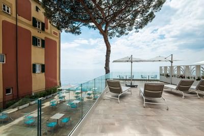 Well arranged tables in terrace at Sublimis Boutique Hotel Camogli